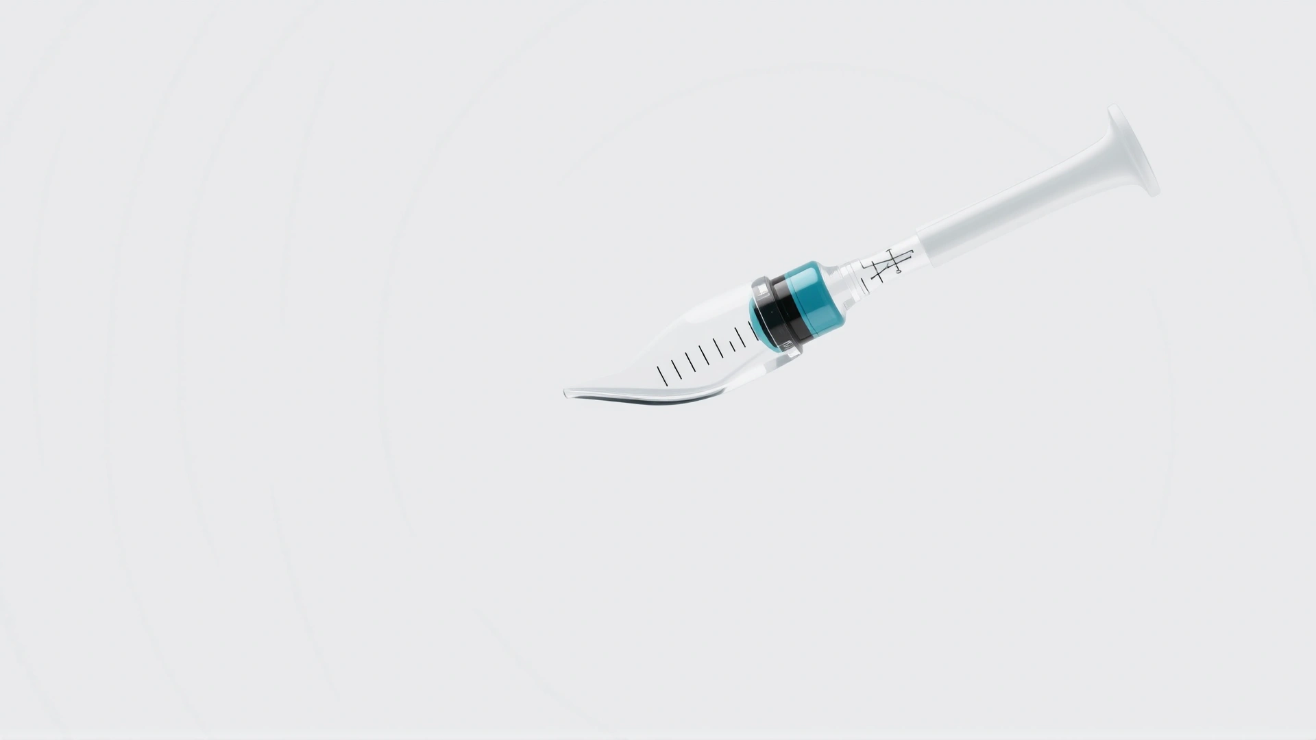 Macro shot of a sterile vaccine syringe filled with clear liquid against a neutral background.